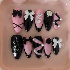 Handmade pink and black coquette gel pressons